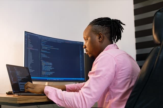 Professional African developer working with modern technology